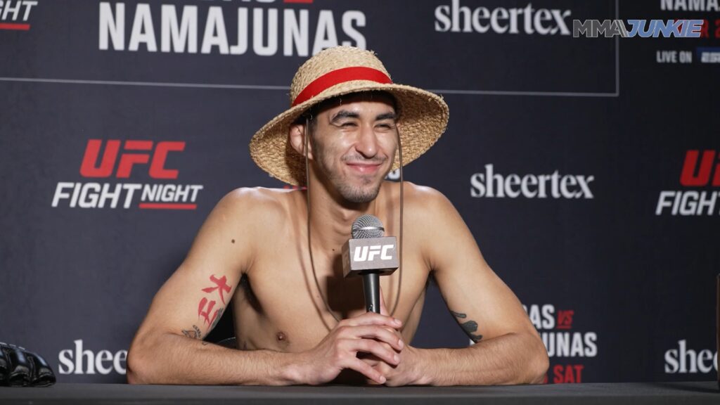 Fernando Padilla wearing Luffy's Straw Hat from One Piece anime/manga